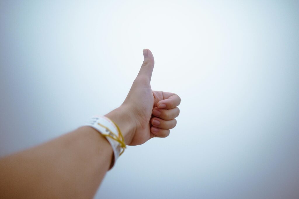 pexels photo 193821 193821 A hand giving a thumbs up gesture symbolizes approval and positivity.